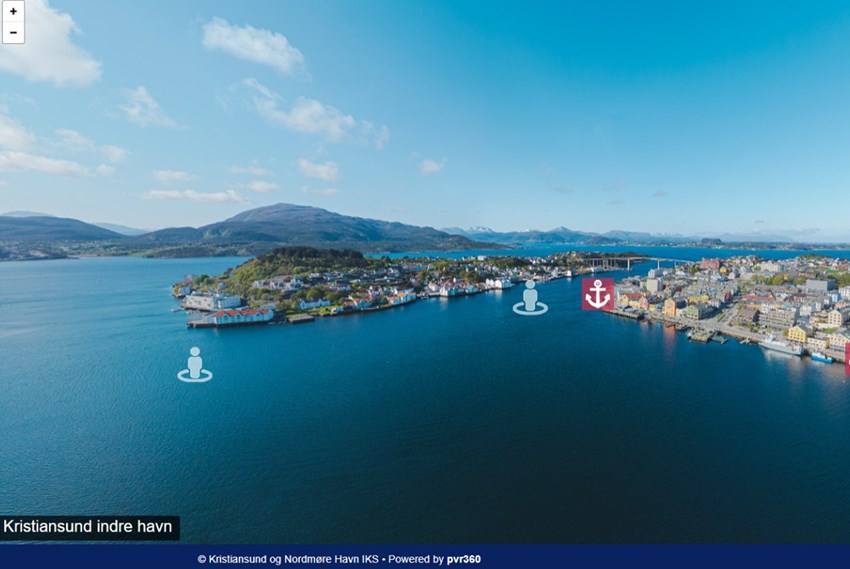 Drobefoto Kristiansund indre havn med Innlandet og Storkaia, fjell i bakgrunn. Skjermbilde fra interaktiv løsning.